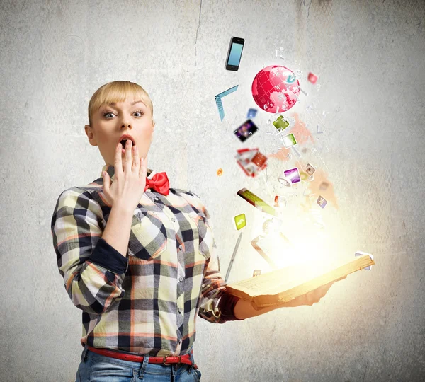 Woman holding opened book in hands — Stock Photo, Image