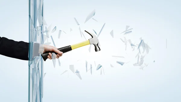 Man breaking glass — Stock Photo, Image