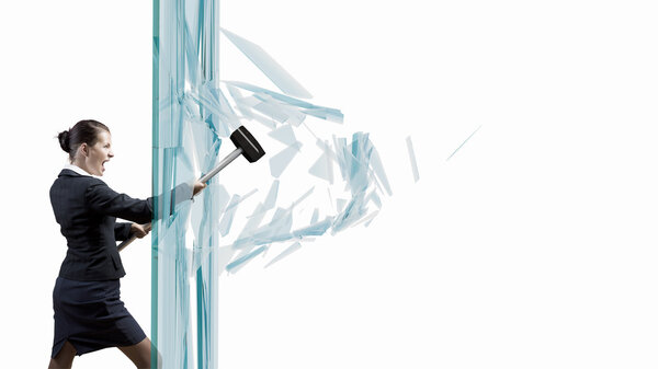Businesswoman breaking glass