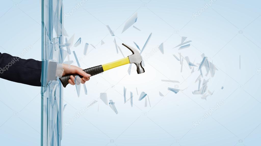 Man breaking glass