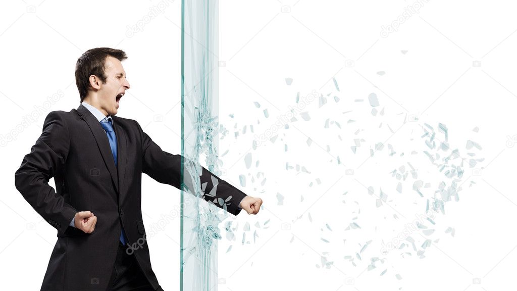 Businessman breaking glass