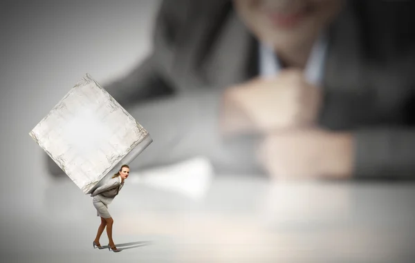 Woman carrying cube — Stock Photo, Image