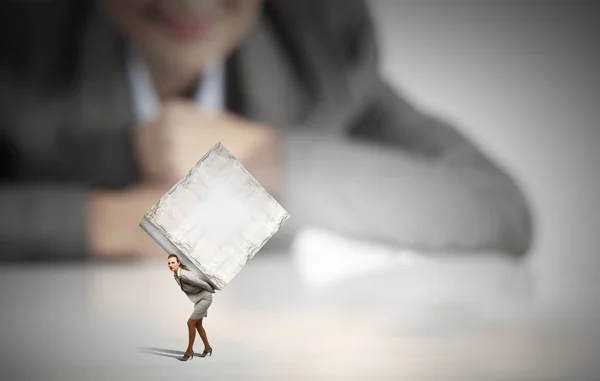 Woman carrying cube — Stock Photo, Image