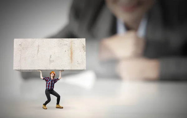 Woman carrying cube — Stock Photo, Image