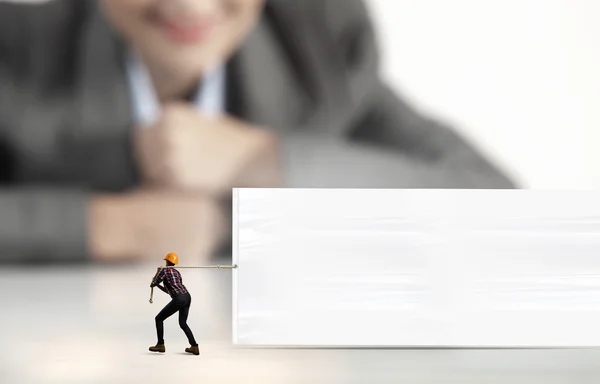 Builder with banner — Stock Photo, Image