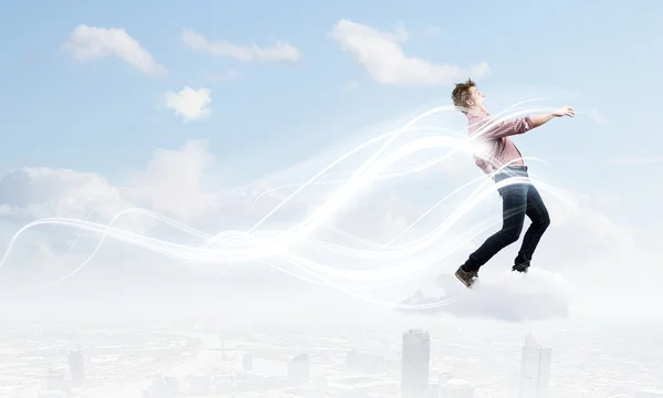 Man walking on cloud — Stock Photo, Image