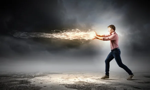 Man throwing fire ball — Stock Photo, Image