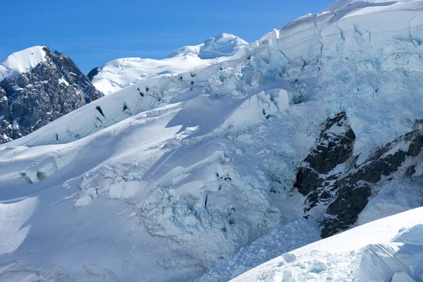 Snowy mountains — Stock Photo, Image