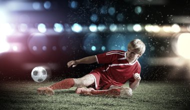 Slayt mücadele yaparken futbolcu