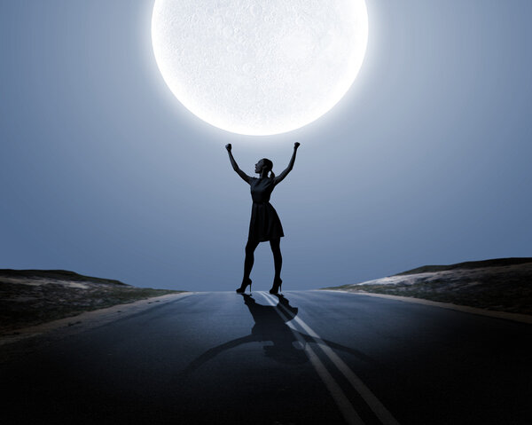 Woman and full moon