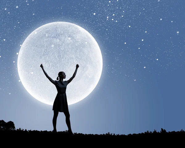 Woman and full moon — Stock Photo, Image