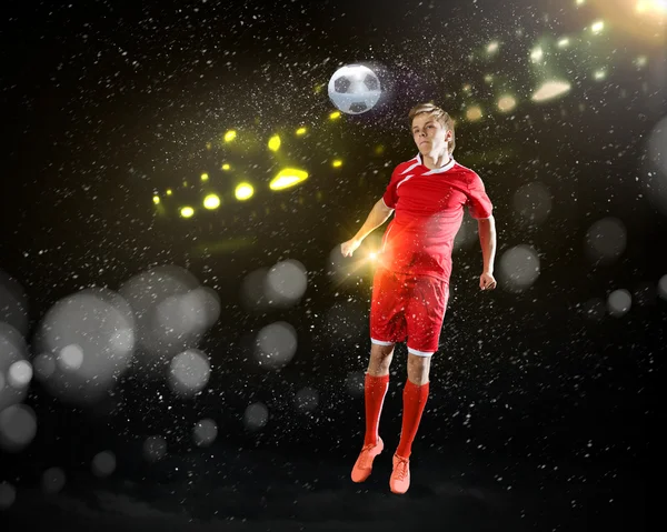 Football player kicking ball — Stock Photo, Image