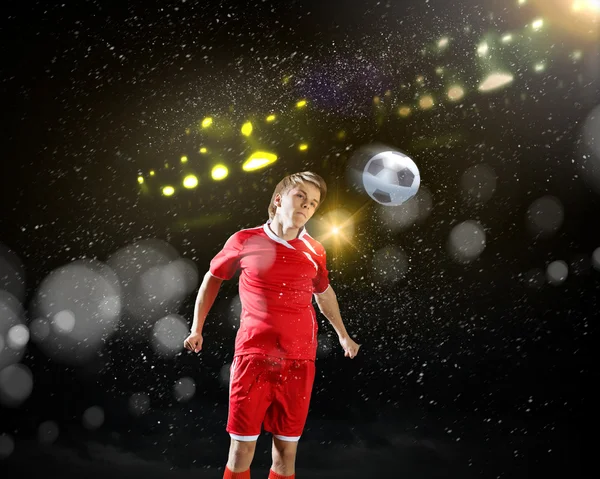 Football player kicking ball — Stock Photo, Image