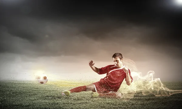 Voetbal speler op stadion — Stockfoto