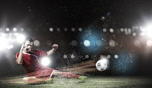 Voetbal speler op stadion — Stockfoto