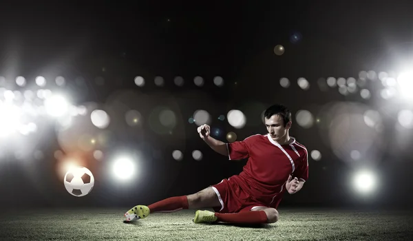 Voetbal speler op stadion — Stockfoto