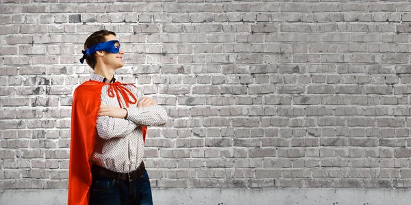 Man wearing mask and cape — Stock Photo, Image