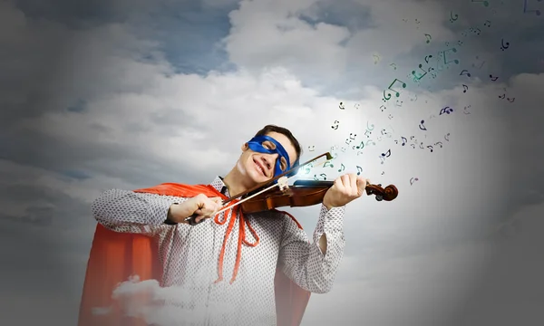 Superman tocando el violín — Foto de Stock