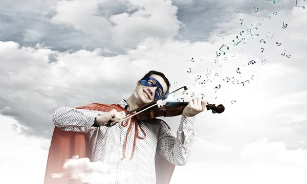 Superman spela fiol — Stockfoto
