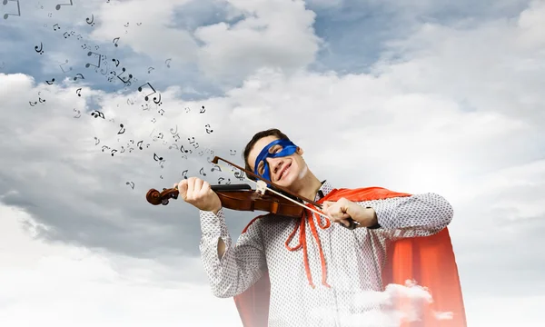 Super-Homem tocando violino — Fotografia de Stock