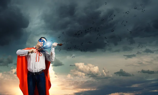 スーパーマン演奏ヴァイオリン — ストック写真