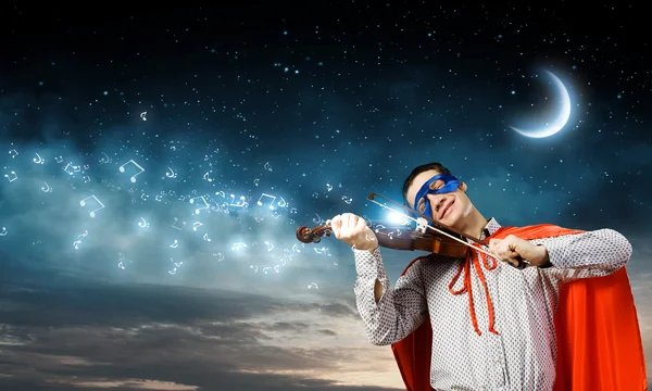 Superman spelen viool — Stockfoto
