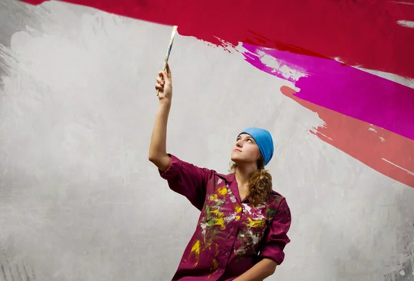 Woman with paintbrush — Stock Photo, Image