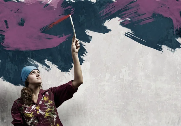 Woman with paintbrush — Stock Photo, Image