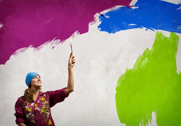 Woman with paintbrush — Stock Photo, Image