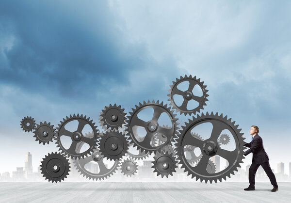 Деловой механизм для перемещения шестеренок
