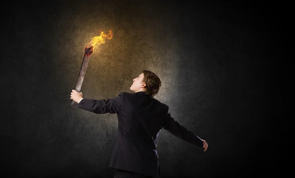 Man with torch — Stock Photo, Image