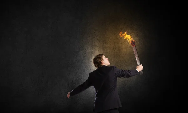 Man with torch — Stock Photo, Image