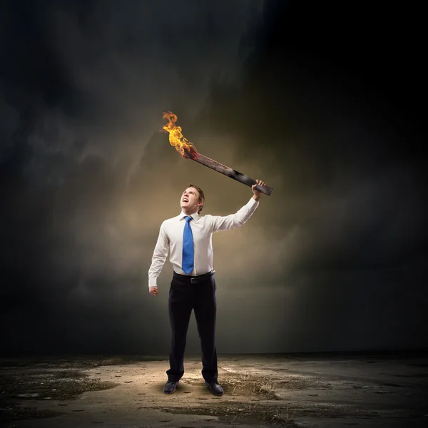 Man with torch — Stock Photo, Image