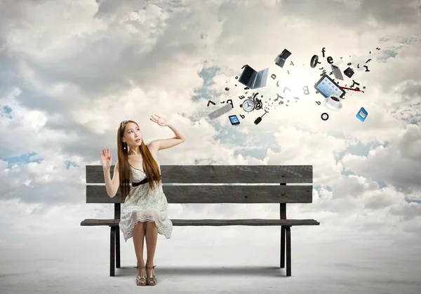 Girl on bench — Stock Photo, Image