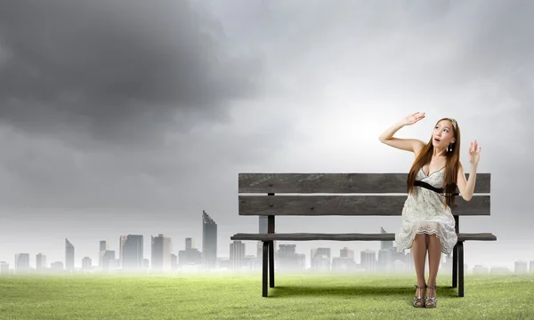 Girl on bench — Stock Photo, Image