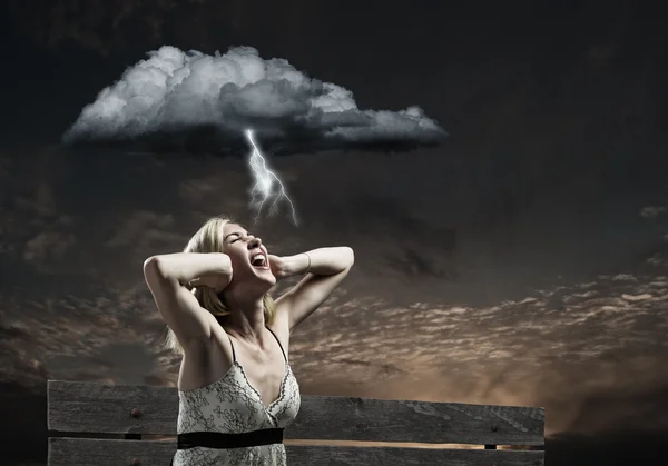 Young woman closing ears with palms and screaming — Stock Photo, Image