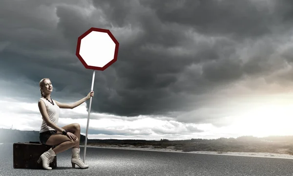 Girl with roadsign — Stock Photo, Image