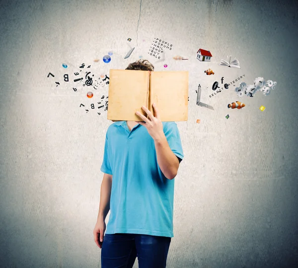 Man holding open book — Stock Photo, Image