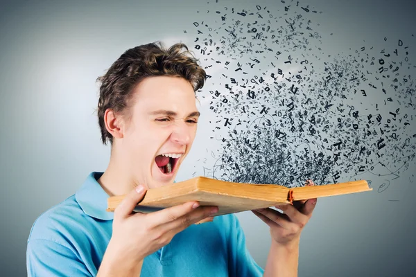 Man holding open book — Stock Photo, Image