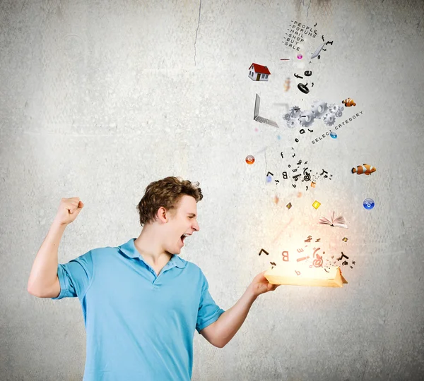 Man holding open book — Stock Photo, Image