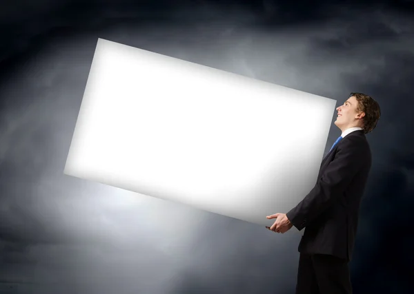 Man carrying banner — Stock Photo, Image