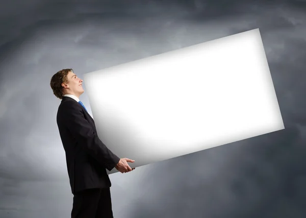 Man carrying banner — Stock Photo, Image