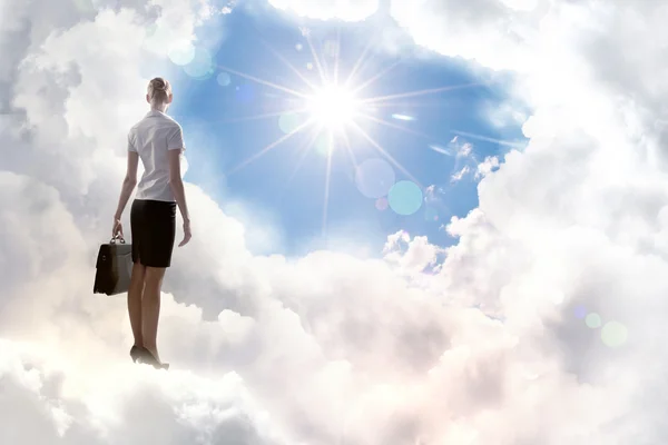 Businesswoman in heaven — Stock Photo, Image