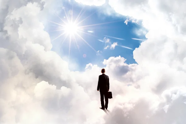 Businessman in heaven — Stock Photo, Image