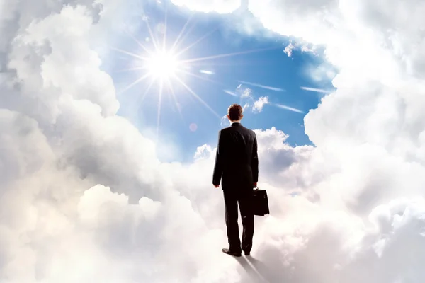 Businessman in heaven — Stock Photo, Image