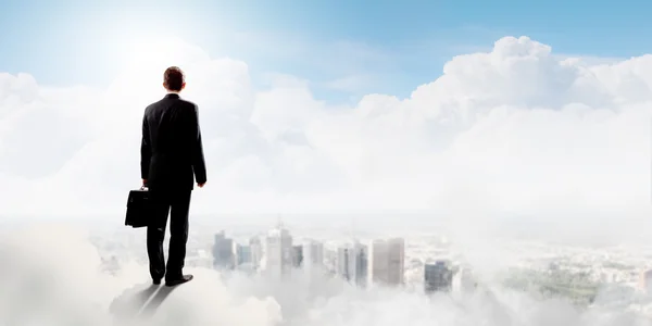 Businessman in heaven — Stock Photo, Image