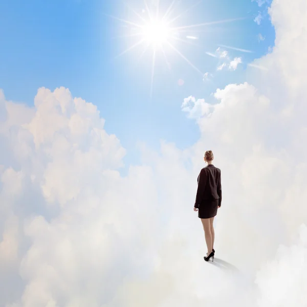 Businesswoman in heaven — Stock Photo, Image