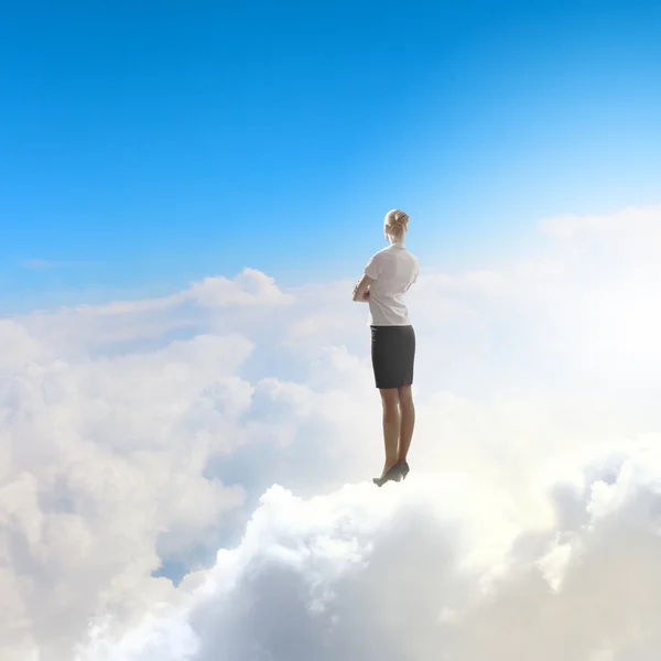 Businesswoman in heaven — Stock Photo, Image