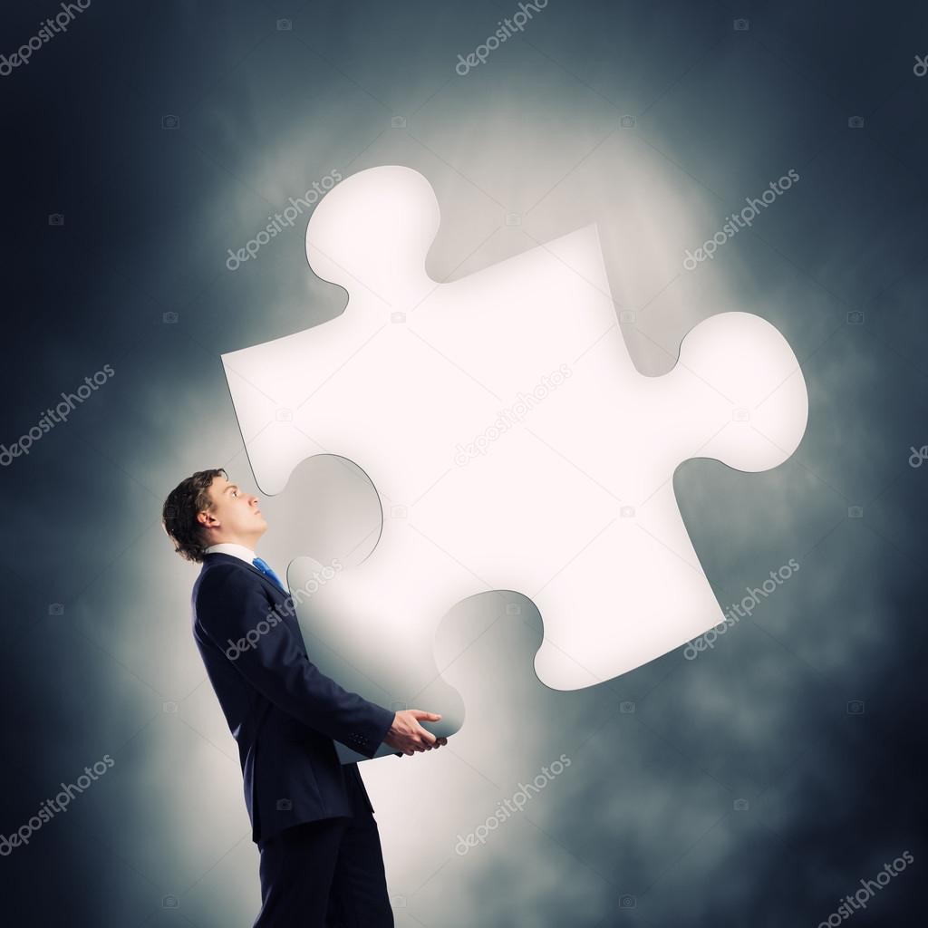 Man carrying puzzle