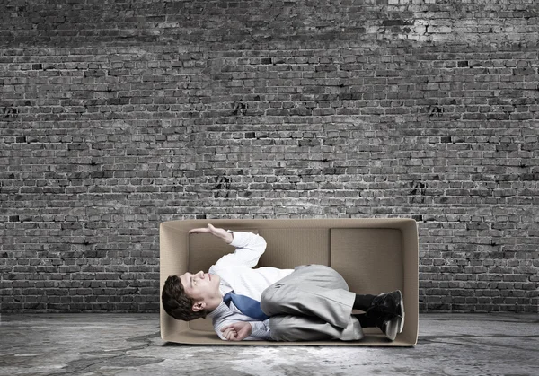 Hombre en caja — Foto de Stock